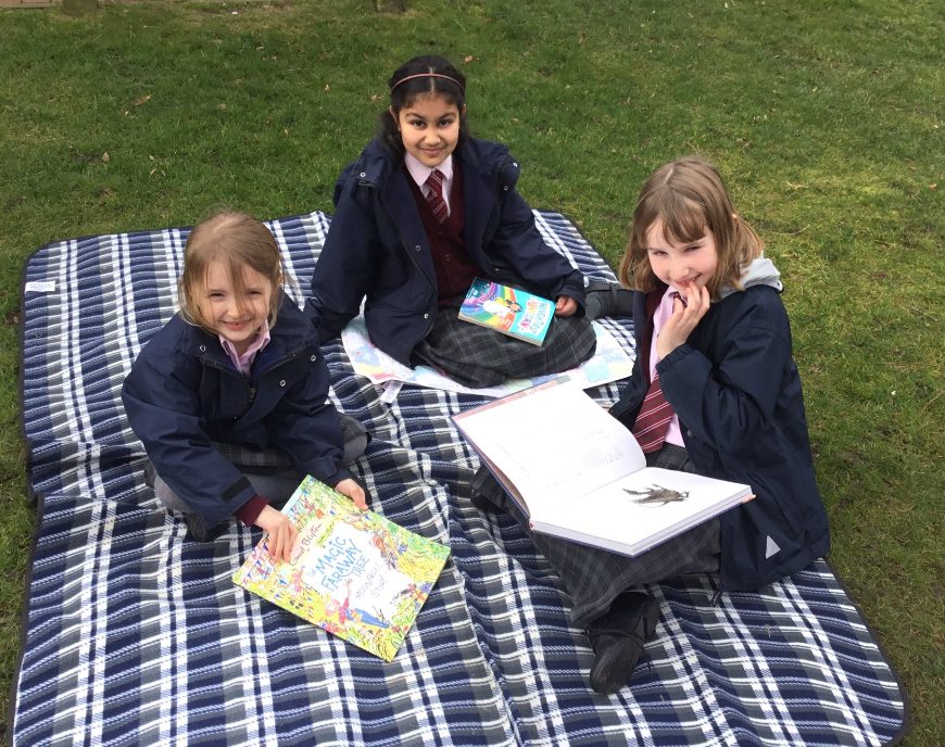 Three Private School Pupils Reading Stories Outside