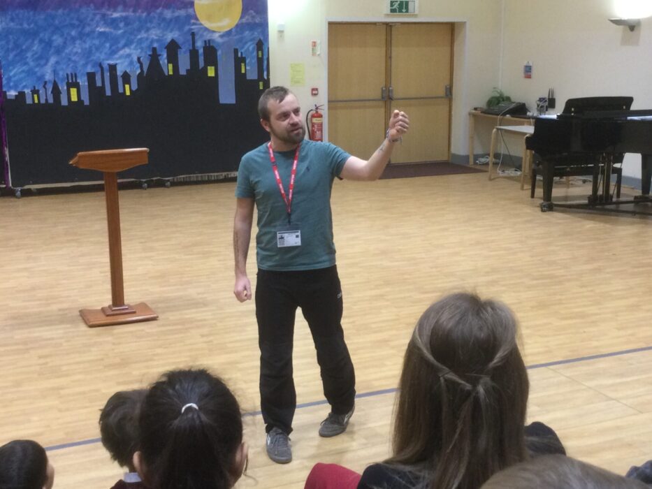 Primary School Pupils Listening To Different Stories To Celebrate World Book Day